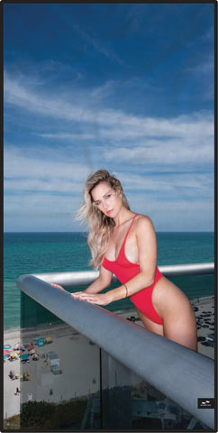 Microfiber quick dry beach towel with image of Paige in a red bathing suit and on a hotel balcony